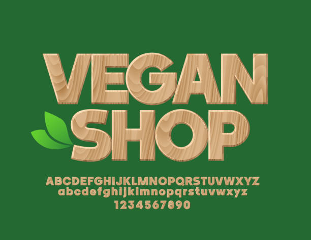 illustrations, cliparts, dessins animés et icônes de emblème de vecteur avec texte vegan shop avec alphabet - text wood alphabet nature