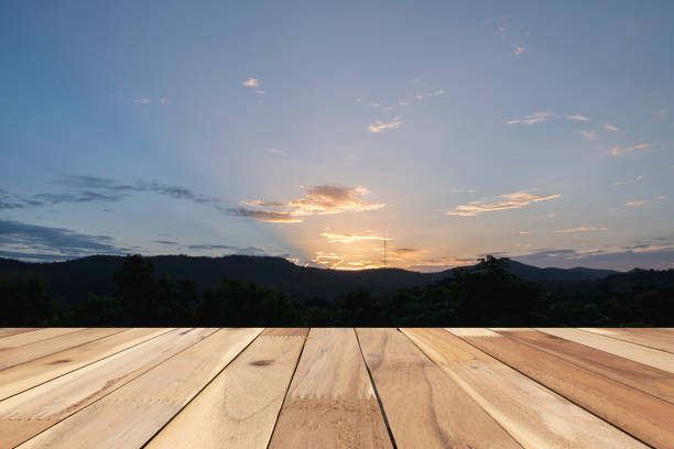istock Empty wooden of brown on front sunset background , abstract background, template 1026149546