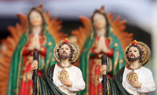 istock Religious icons statuary on display at flea market 1026155560