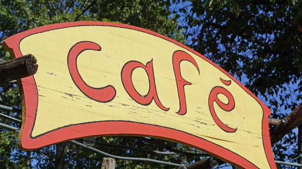 istock Red and Yellow Painted Wooden Cafe Sign 1026156362