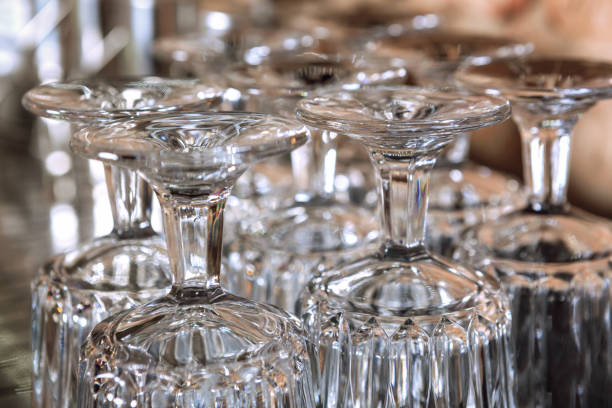 istock Group of glasses standing upside down. 1026159200