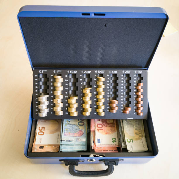 istock Cashbox with euro-shine and coins 1026159330