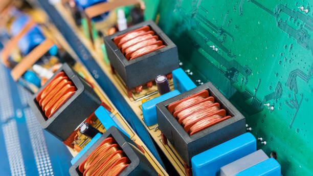 istock Circuit boards for PC mainboards and coils of disassembled fluorescent lamp starters 1026177456
