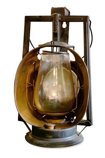 old rusty kerosene lamp with mct glass on a white background