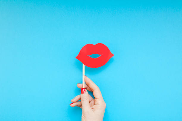 istock Red paper photo booth props female lips 1026195258