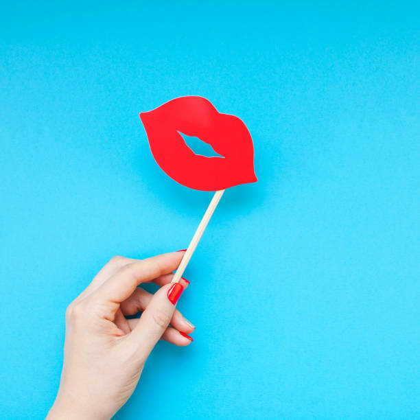 istock Red paper photo booth props female lips 1026195288