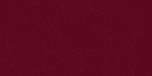 istock Colored  skin texture, natural or faux maroon leather background, closeup. 1026201474