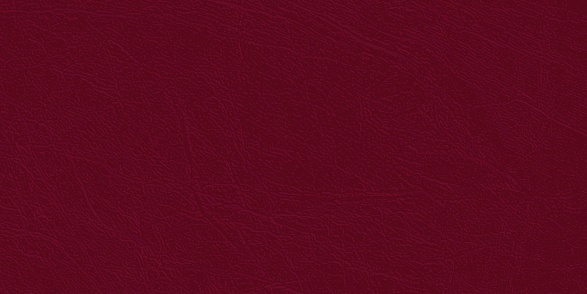 Colored  skin texture, natural or faux claret leather background. Maroon leatherette, closeup.