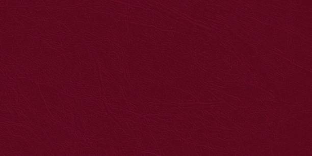 Colored  skin texture, natural or faux maroon leather background, closeup. Colored  skin texture, natural or faux claret leather background. Maroon leatherette, closeup. maroon stock illustrations