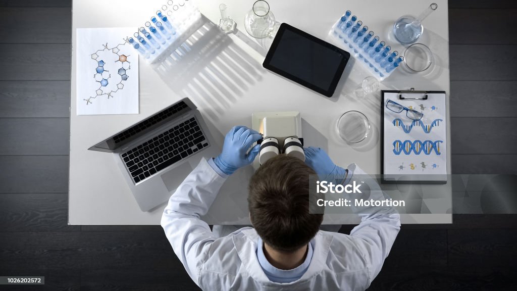 Lab Microscope Top View Lab Assistant Adjusting Microscope Objective Researching Material Top ...