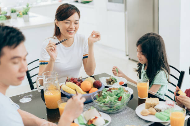 istock Happy family having a breakfast together 1026205428