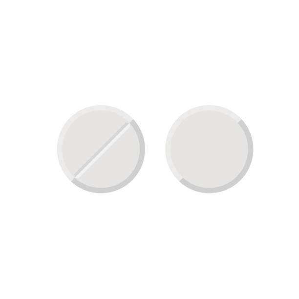 istock Set of white round medicine pills 1026215496