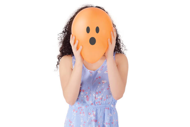 istock Young woman with a balloon on his head 1026218552