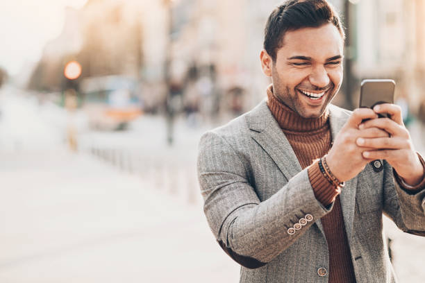 istock Happy man with cell phone 1026221046
