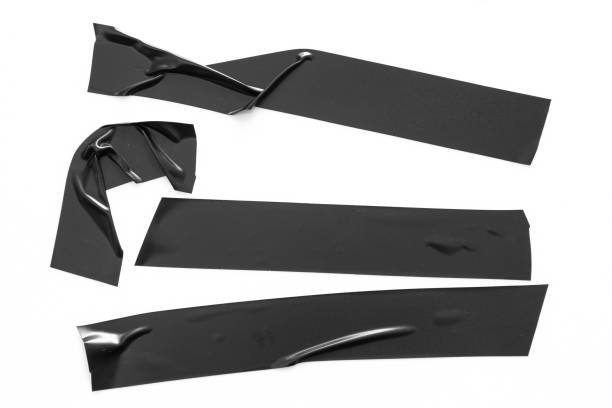 istock Set of black tapes on white background. Torn horizontal and different size black sticky tape, adhesive pieces. 1026239024