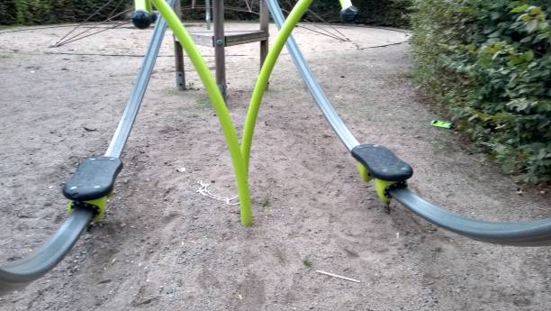 istock Close up colorful playground swing from left to wright 1026241624