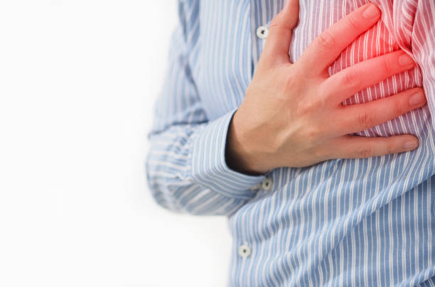 istock man holding his heart with his hand 1026252198