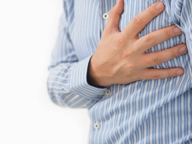istock man holding his heart with his hand 1026255156