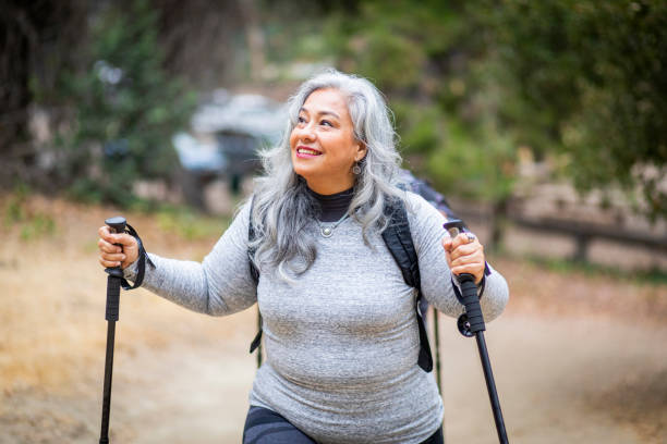 istock Senior Mexican Woman Hiking 1026260576