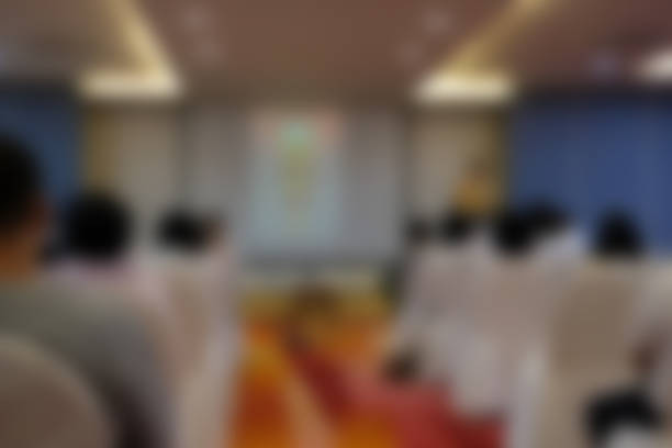 istock stage & presentation screen in seminar conference room. blurry background 1026273764