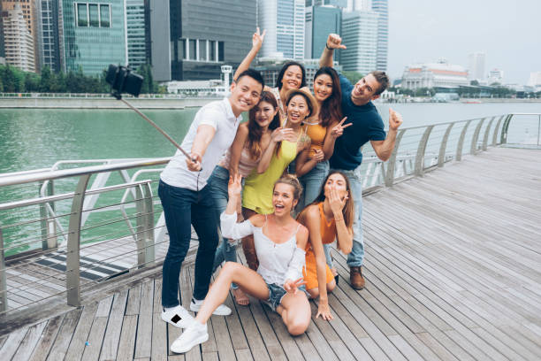 istock Friends taking selfie and making faces 1026273968