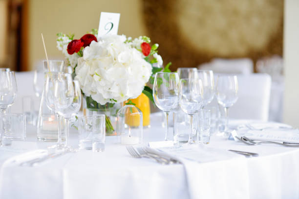 istock Beautiful table setting with crockery and flowers for a party, wedding reception or other festive event 1026280092