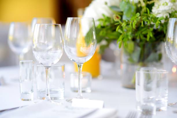 istock Beautiful table setting with crockery and flowers for a party, wedding reception or other festive event 1026280124