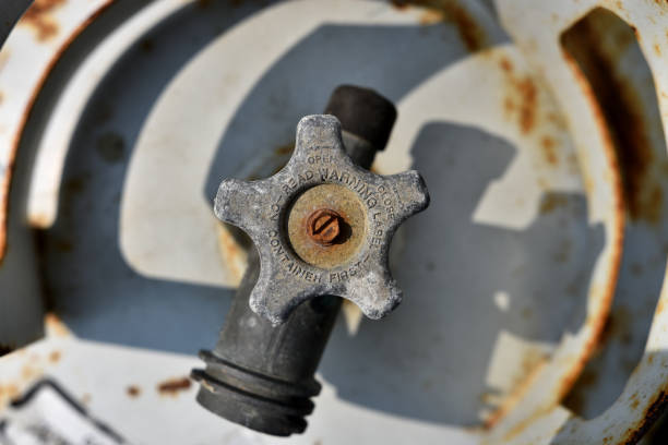 istock Rusted Old Propane Cylinder Shut Off Valve Close Up 1026285144