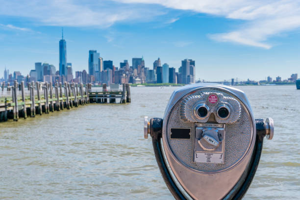 istock Tower binoculars facing Manhattan skyline in New York City 1026285240