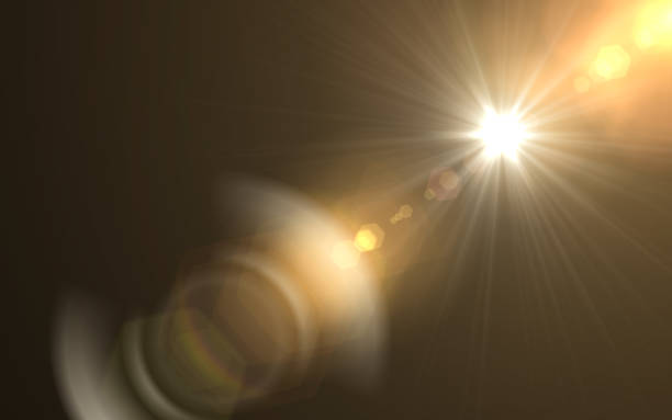 istock Abstract sun burst with digital lens flare background.Abstract digital lens flares special lighting effects on black background 1026313948