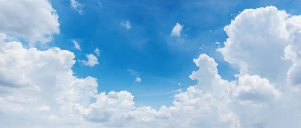 Photo of clouds and bright blue sky background, panoramic angle view