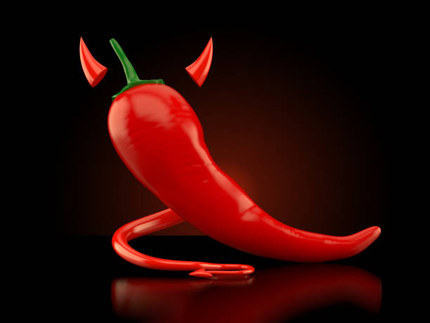 paprika mit teufelshörnern und tail - devil chili stock-fotos und bilder