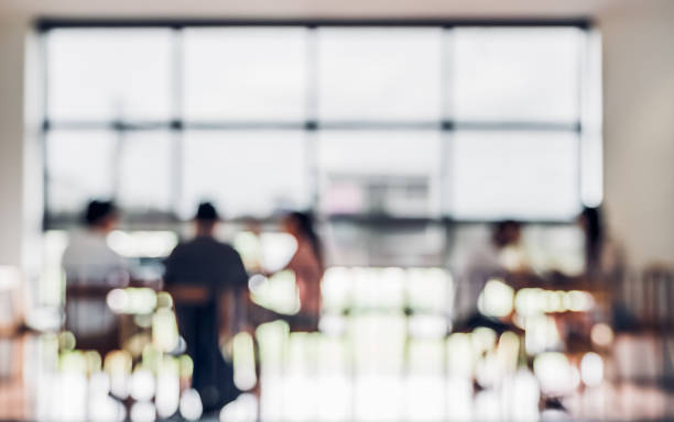 istock Blurred background people sitting in Coffee shop and co working space blur background with bokeh light.leisure lifestyle backdrop. 1026357392