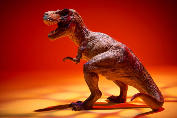 istock the Dinosaur tyrannosaurus in red light effect 1026360080