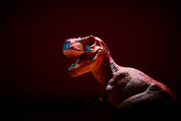 istock the Dinosaur tyrannosaurus in red light effect 1026360130