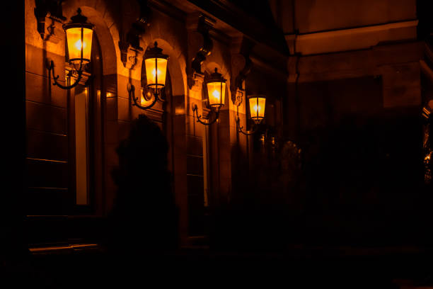 Old lanterns on a wall of house