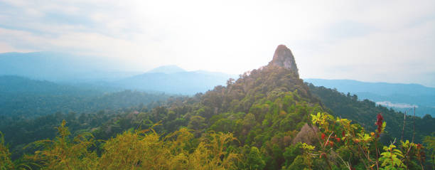 istock Bukit Tabur hill with water dam in early morning. 1026362718