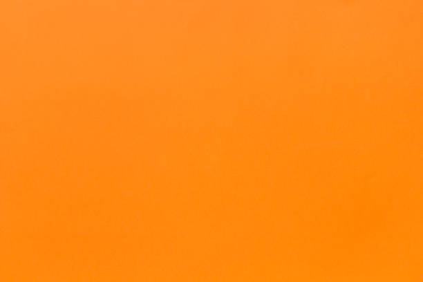 istock new texture dense orange color paper, background 1026393618