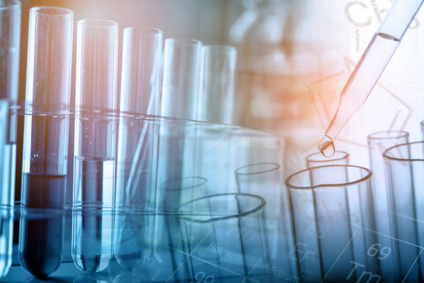 istock Laboratory glassware containing colorful chemical liquid, lab research and development concept 1026397066