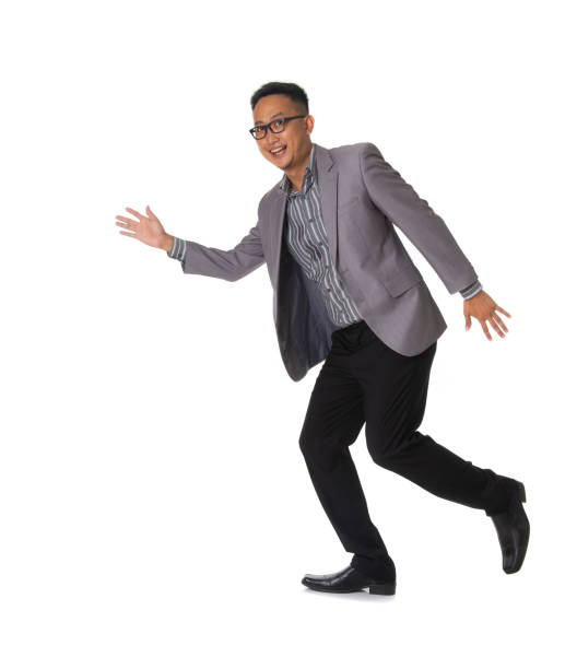 istock happy young business man running 1026399592