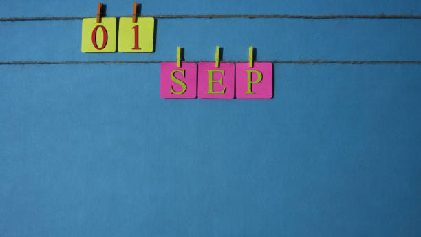 istock September, copy space with rope colored papers calendar 1026400190