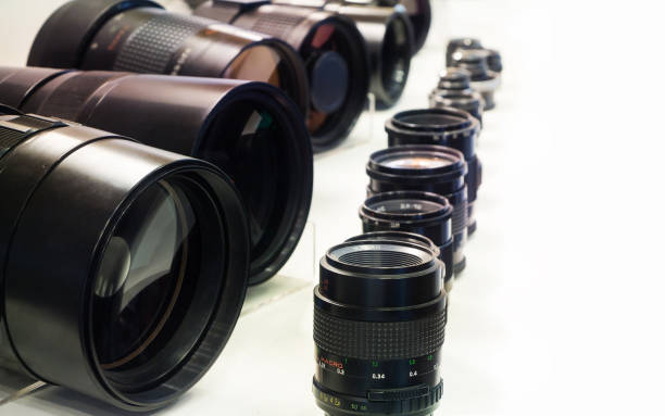 istock Collection of macro camera lenses in a row 1026407162