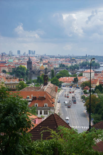 istock Panoramic view of prague city with nice clouds in summer 1026407248