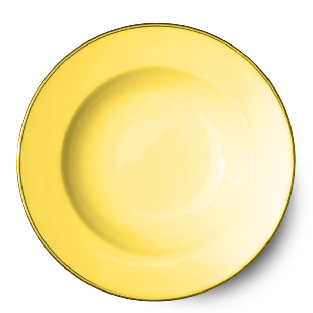 istock Yellow plate isolated on white background. 1026407260