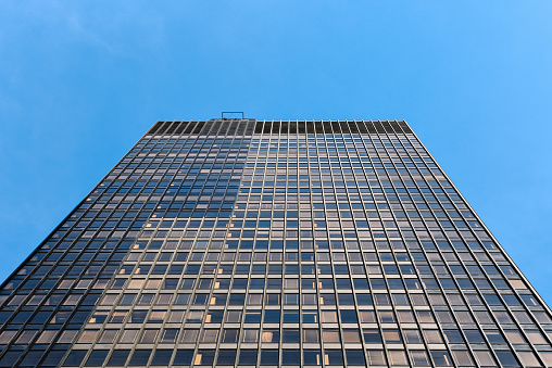 New York City, USA - June 21, 2018: Seagram Building in Park Avenue, Manhattan. Low angle view against sky. It was designed by Mies van der Rohe architect