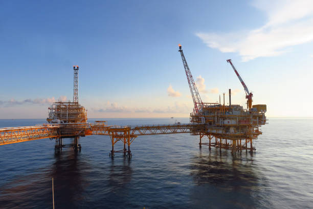 istock Asia, blue, business, commissioning, construction, crane, drill, drilling, energy, engineering, environment, environmental, exploration, factory, fire, flare, fuel, gas, gasoline, greenhouse, gulf, hard, industrial, industry, installation, light, maintena 1026420108