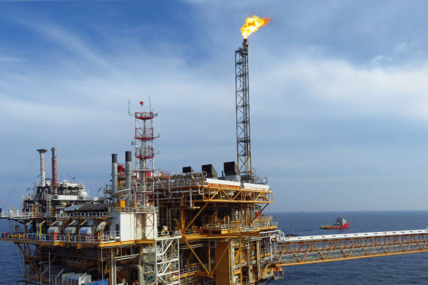 istock Asia, blue, business, commissioning, construction, crane, drill, drilling, energy, engineering, environment, environmental, exploration, factory, fire, flare, fuel, gas, gasoline, greenhouse, gulf, hard, industrial, industry, installation, light, maintena 1026420132