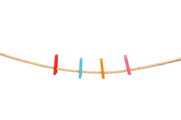 Rope with colored pegs isolated on white background