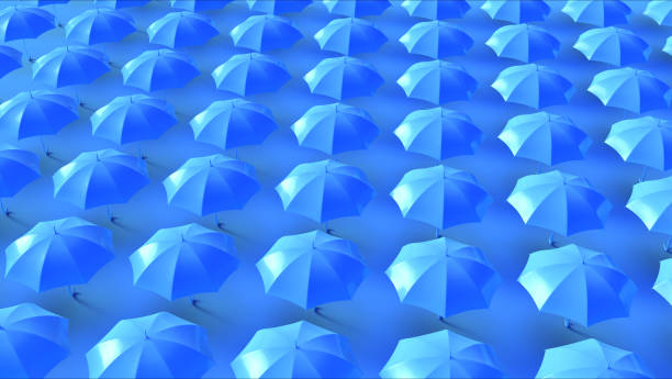istock Lots of Blue Umbrellas in a Grid Pattern 1026426640