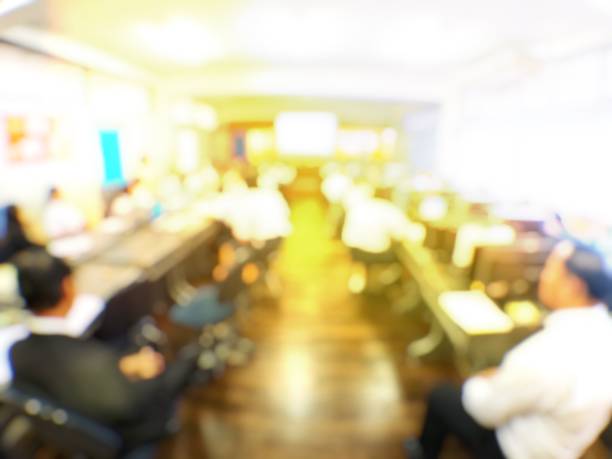 istock Blurred image of group of students are learning and lecture and using computer together in classroom for study and workshop in computers room at school. education technology or training concept. 1026427166